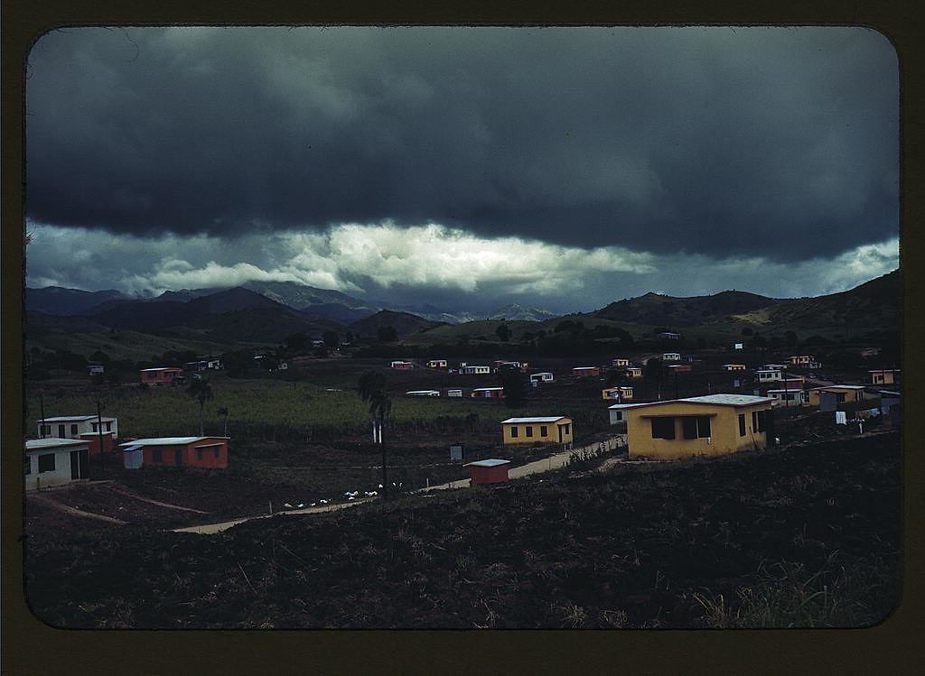 Federal housing project on the outskirts of the town of Yauco, Puerto Rico. About an acre of land for gardens is provided with each house (The Library of Congress) | Jack Delano, photographer.