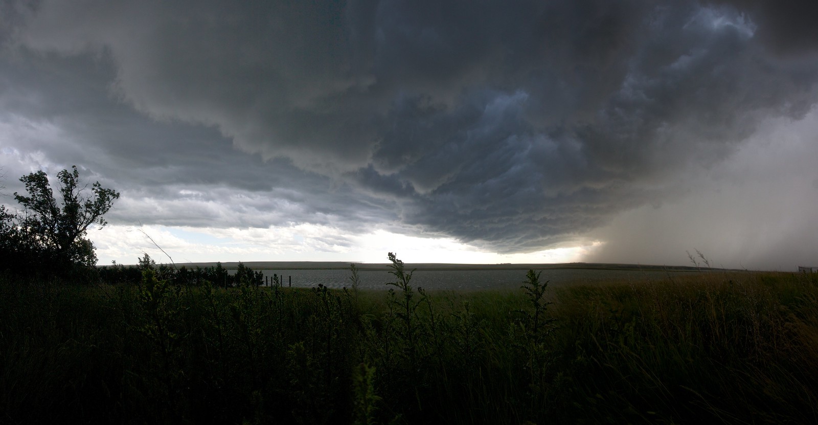 Approaching Thunder- Unlike many other parts of our Nation, where skyscape views are obstructed by trees, mountains, and higher-density land uses, in the the Northern Prairie one can see whole storm fronts advancing | Medicine Lake NWR Storm