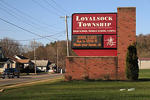 An electronic sign announces school closure due to COVID-19 in Williamsport, PA, USA. Brinacor
